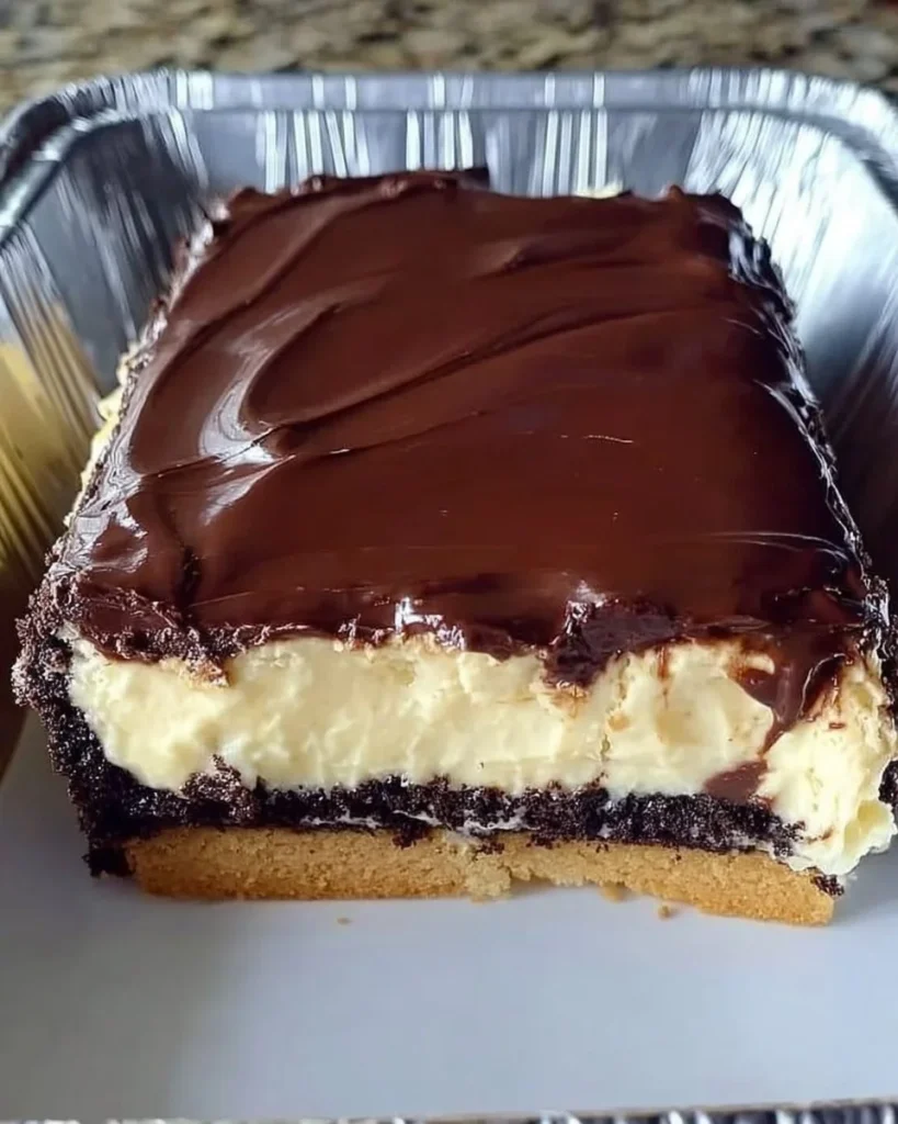 No-bake chocolate eclair cake with layers of chocolate and cream